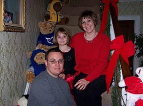 Rogers 2004 Christmas Photo at Leone's house - Clockwise they are Tim, Alivia and Michelle
